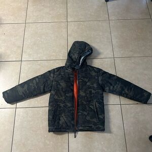 Boys size small/8 puffer jacket worn twice.